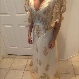 Elegant Cream and Gold Gown with Lace Details